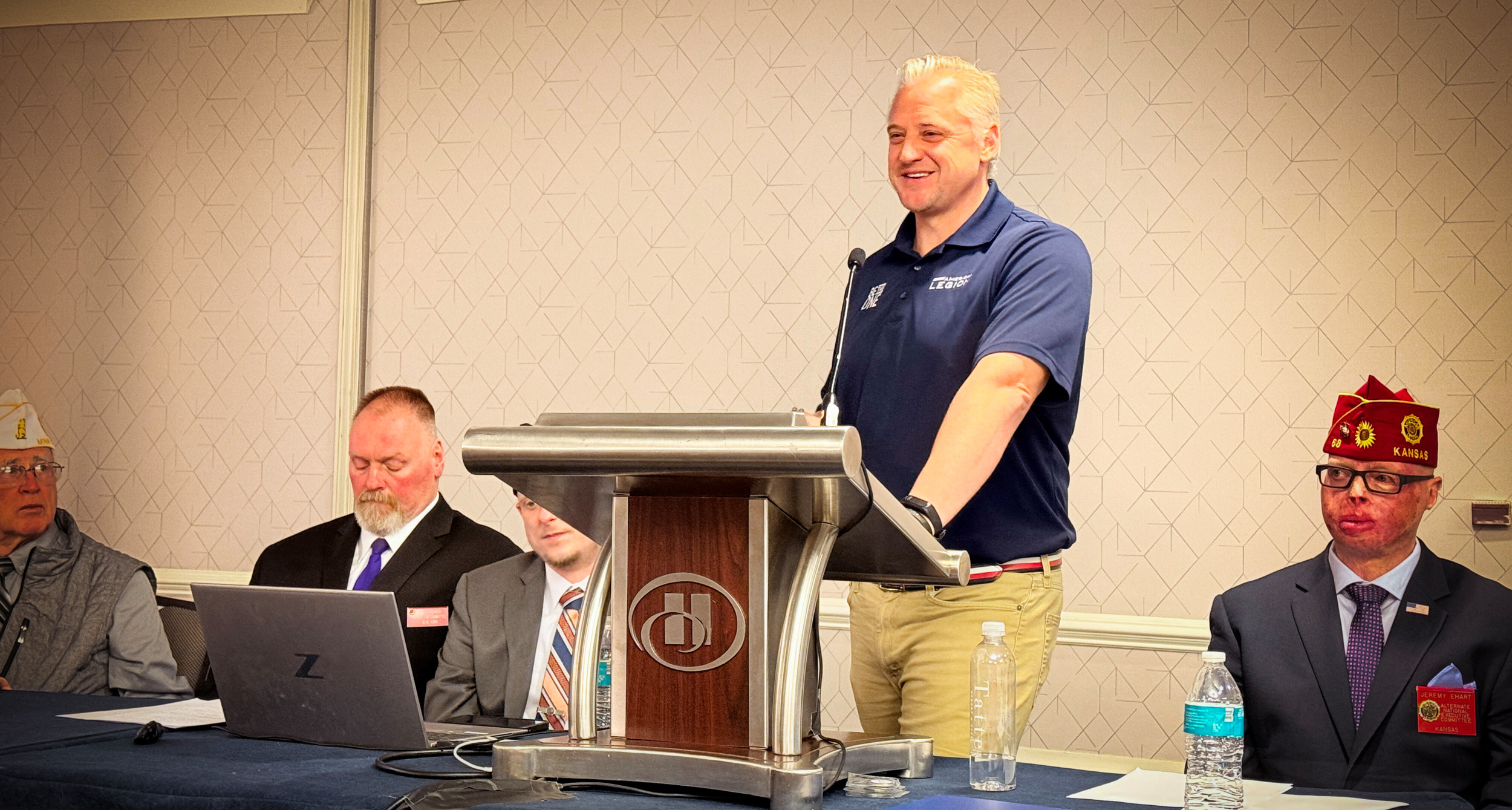 Adam Marr, Director of Operations for the Veteran Mental Health Leadership Coalition, speaks to members of the Be the One Mental Wellness Committee.