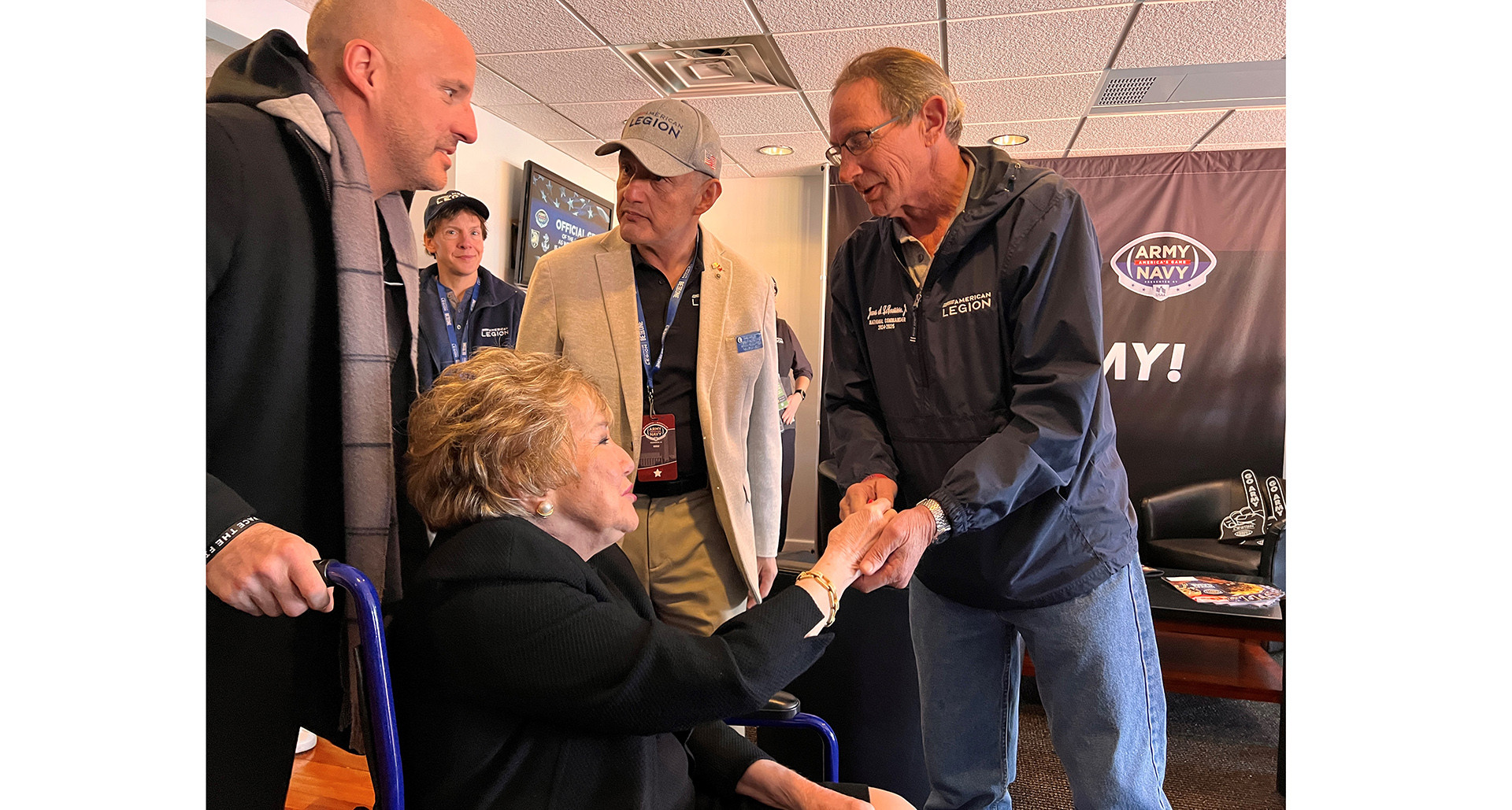 Former Sen. Elizabeth Dole visits with National Commander James LaCoursiere Jr. at the Army-Navy Game last weekend.