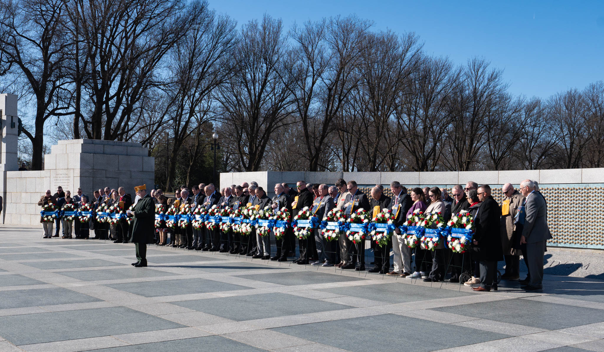 Sons of The American Legion pray before memorial wreaths are placed at the World War II Memorial in Washington, D.C., on Sunday, February 23. Photo by Hilary Ott /The American Legion