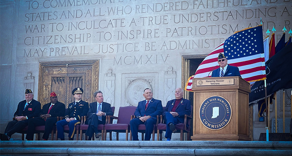 American Legion National Headquarters Be the One Manager Tony Cross speaks at Monday's Veterans Day service at the Indiana War Memorial in Indianapolis.