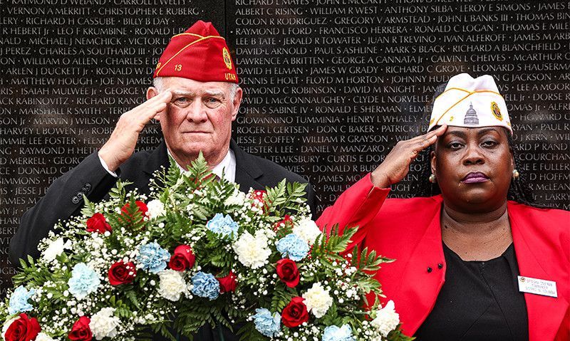 Vietnam Wall reconnects friends on a day of remembrance