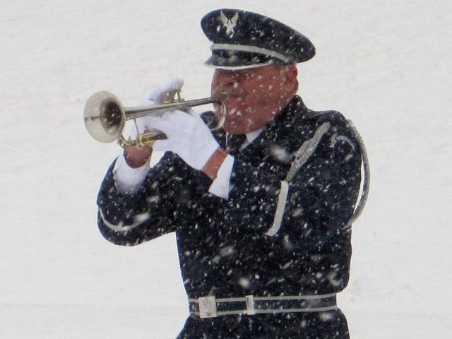 Military bugler performs at 10,000th service